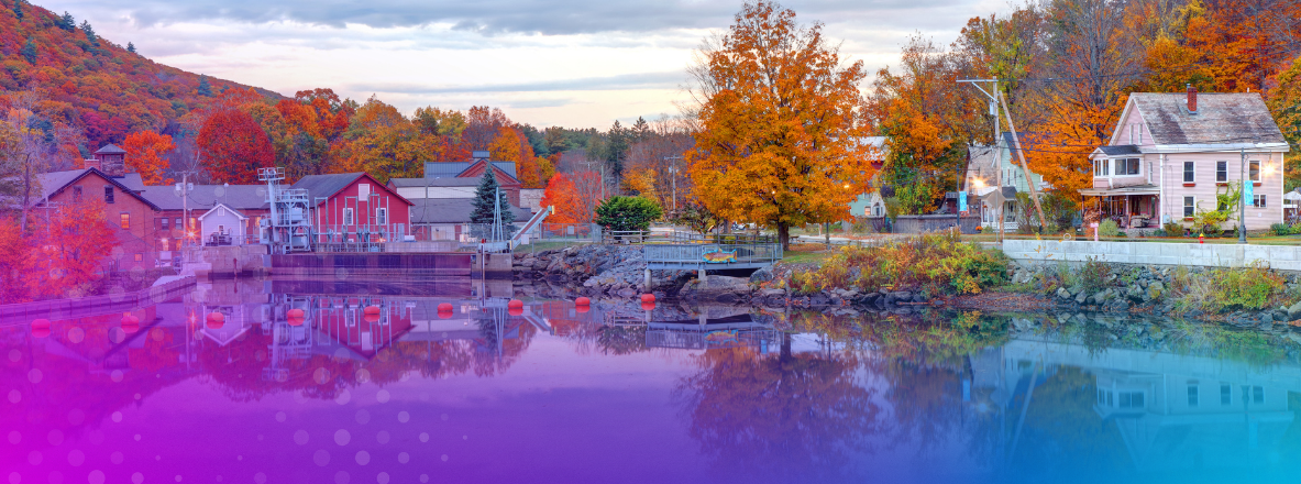 image of lakeside town in the late fall almost winter reflected in lake