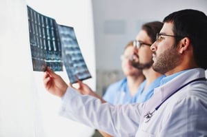 doctors viewing scans