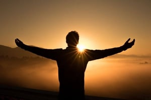 open arms at sunrise