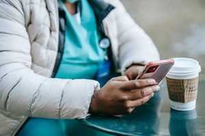 healthcare worker on phone